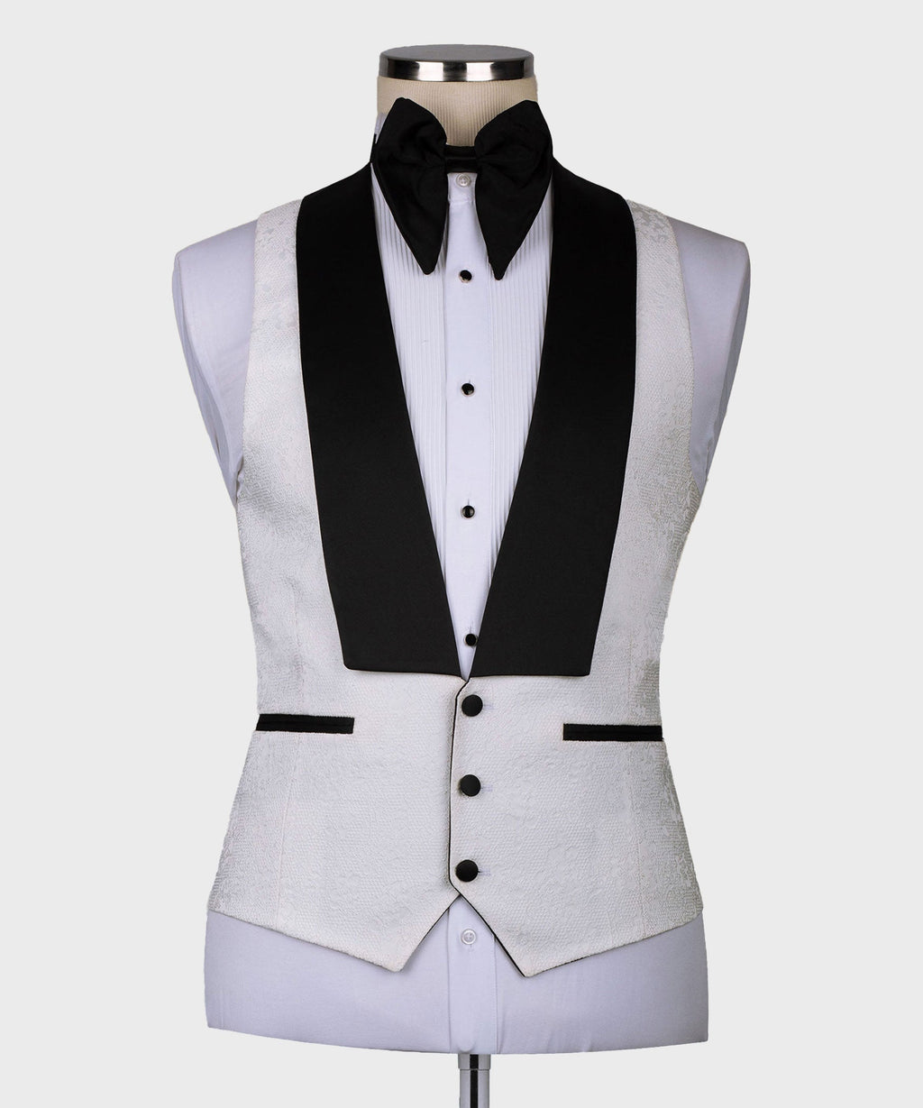 White tuxedo vest with black bow tie and satin lapels, front view on mannequin