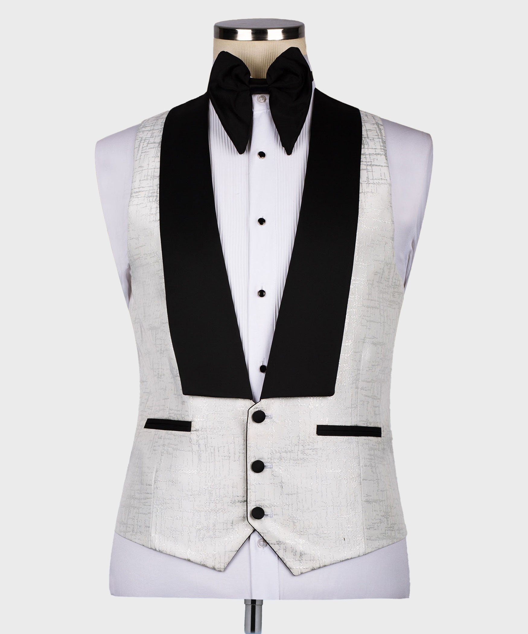 Light gray tuxedo vest with black satin trim, buttons, and white dress shirt