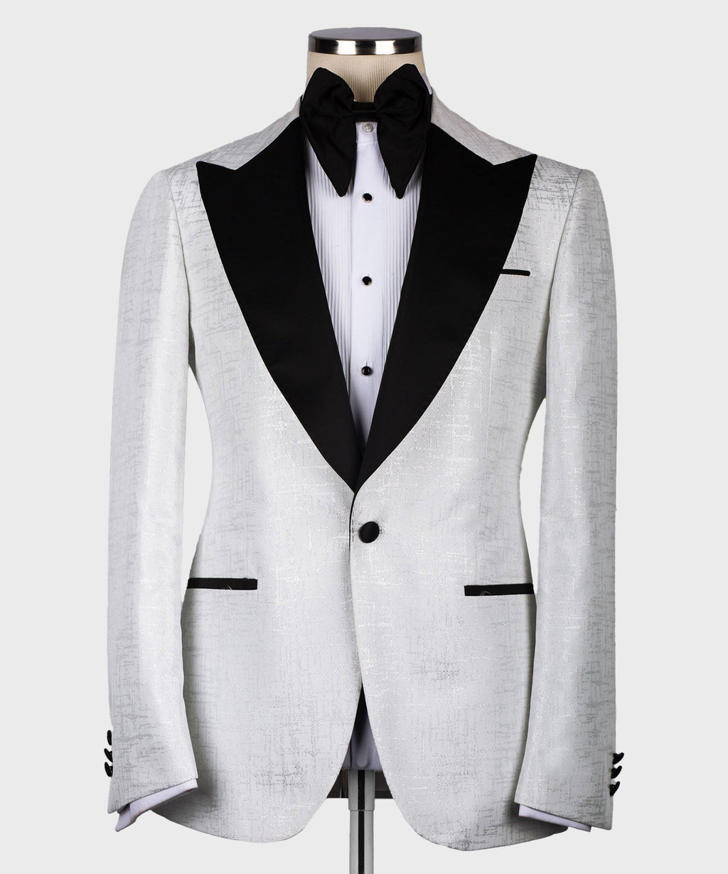 Light gray tuxedo jacket with single-button closure, black lapels, and bow tie