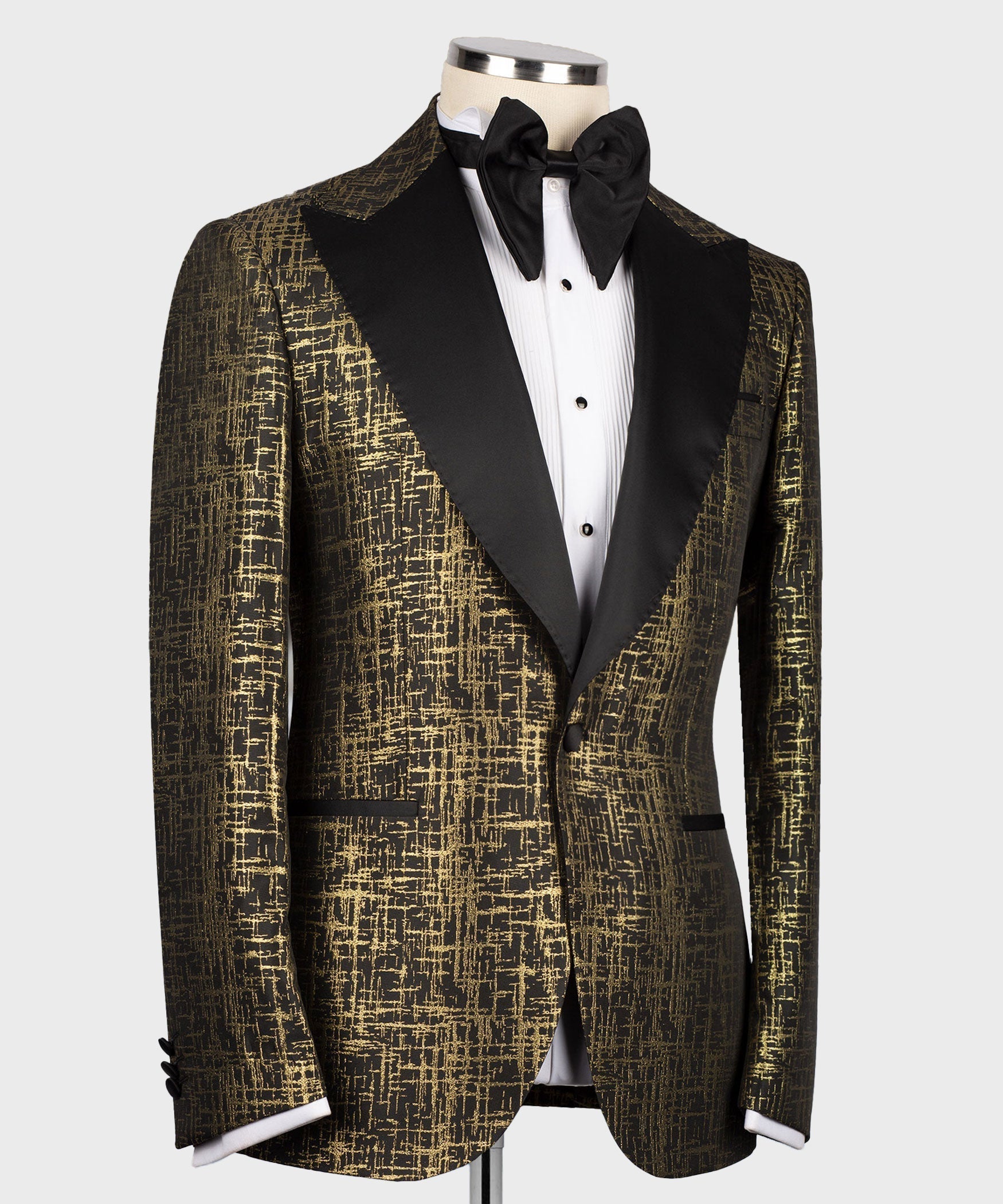 Gold patterned tuxedo jacket front with black satin panels and white dress shirt