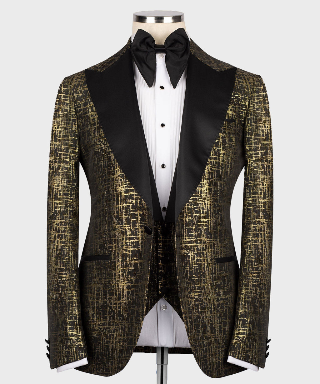 Gold textured tuxedo jacket with black satin lapels, white dress shirt, black bow tie