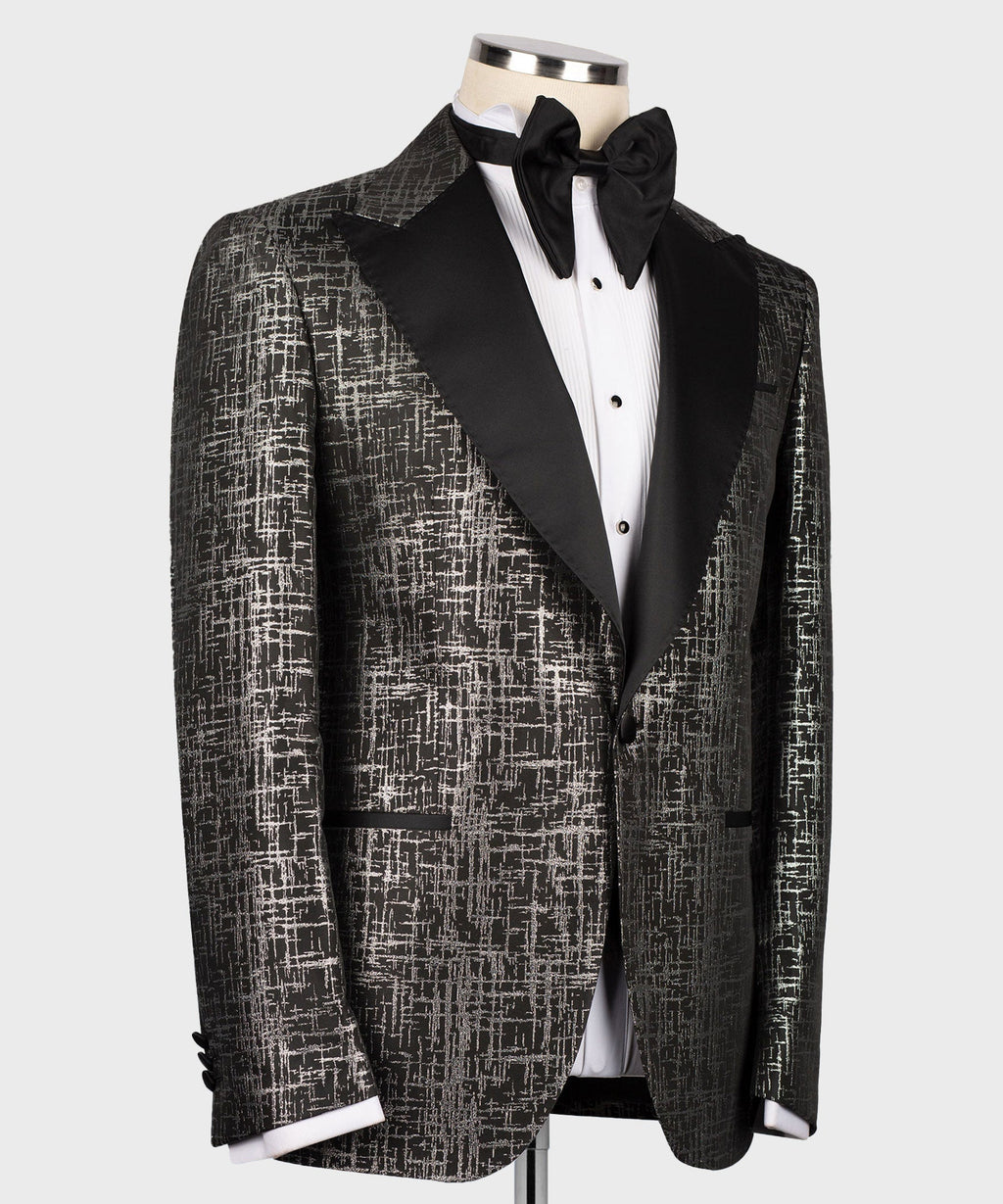 Black tuxedo jacket with pointed satin lapels and distressed patterned texture