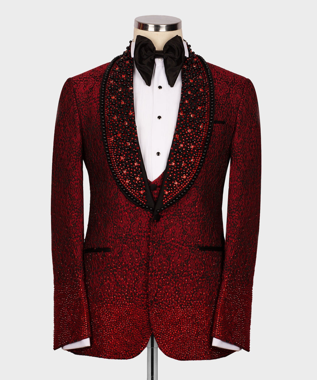 Front view of the luxurious Koss Atelier crimson red floral lace tuxedo jacket featuring a hand-beaded black shawl lapel and ombré crystal hem.