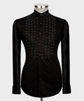 Men's luxury black dress shirt featuring tonal black crystal floral studded embellishments on the chest and collar, styled for US prom and red carpet events.
