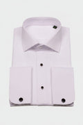 Koss Atelier white pleated dress shirt with a spread collar, double cuffs, and black stud buttons on a plain background.