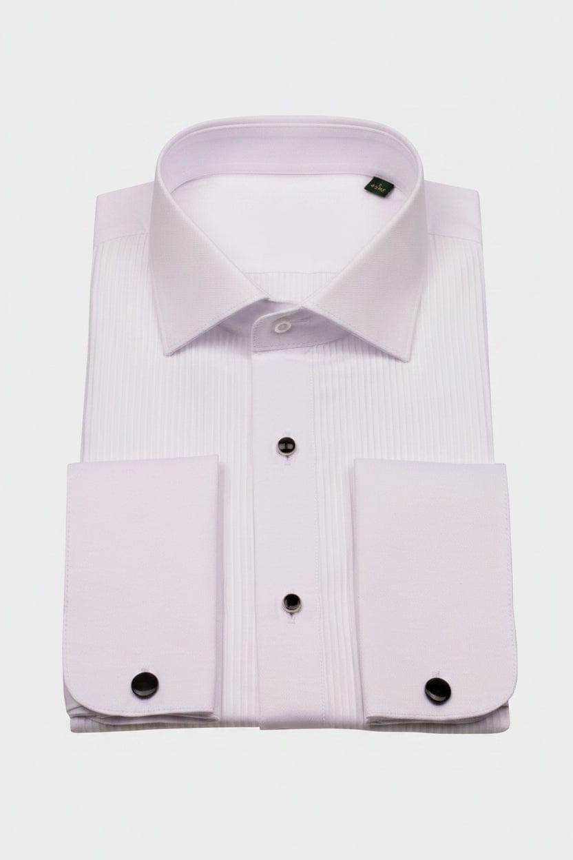 Koss Atelier white pleated dress shirt with a spread collar, double cuffs, and black stud buttons on a plain background.