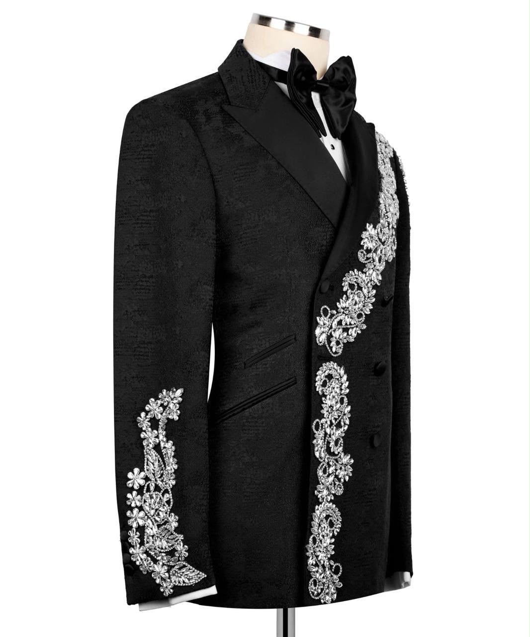 Black tuxedo jacket with silver embroidery on a mannequin 